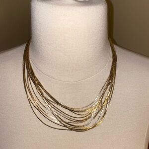 Multilayered gold necklace